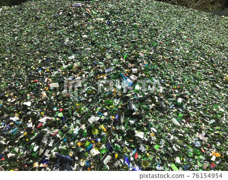 Recycled garbage green in crushed glass bottles Recycled garbage green in crushed glass bottles 76154954