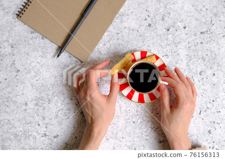 Coffee in a cup, cookies and notepad 76156313
