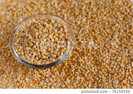 split pigeon peas Organic Toor Dal in Bowl, Selective Focus with Blur Background split pigeon peas Organic Toor Dal in Bowl, Selective Focus with Blur Background 76158589