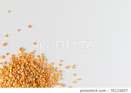 split pigeon peas Organic Toor Dal in Bowl, Selective Focus with Blur Background. split pigeon peas Organic Toor Dal in Bowl, Selective Focus with Blur Background. 76158607