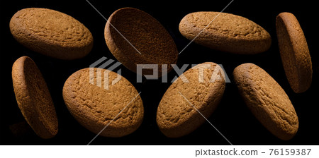 Oatmeal cookies on black background, collection 76159387