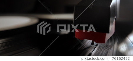 Amazing view over a record player playing a vinyl 76162432