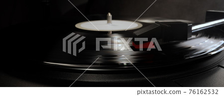 Amazing view over a record player playing a vinyl 76162532