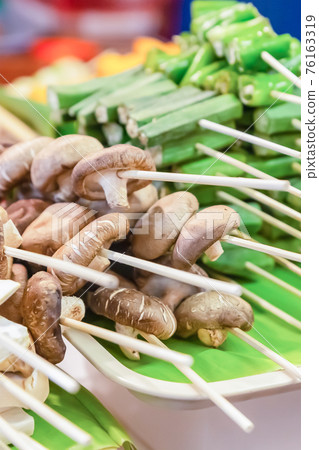 mushroom and vegetable kebabs asia market vertical set selective focus mushroom and vegetable kebabs asia market vertical set selective focus 76163319