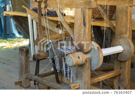 wooden loom, traditional European mechanism for the production of fabric wooden loom, traditional European mechanism for the production of fabric 76163407