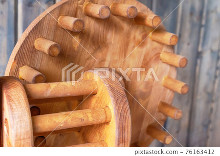 wooden gear part of the mill mechanism, traditional equipment wooden gear part of the mill mechanism, traditional equipment 76163412