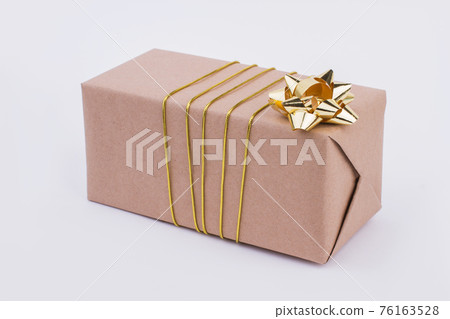Brown paper gift box. Brown paper gift box. 76163528