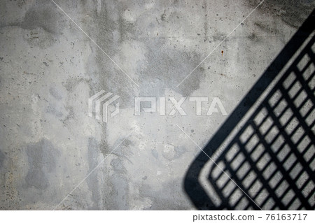 Bad paint. Vintage grunge plaster or concrete stucco surface. Old rough stone on cement pattern wall background. Natural abstract material decoration concept. Bad paint. Vintage grunge plaster or concrete stucco surface. Old rough stone on cement pattern wall background. Natural abstract material decoration concept. 76163717
