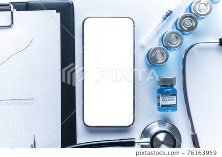 Smartphone mockup. Doctor stethoscope, hospital healthcare charts, syringe with needle and black smartphone with blank screen on medical equipment background. For design application, website project. Smartphone mockup. Doctor stethoscope, hospital healthcare charts, syringe with needle and black smartphone with blank screen on medical equipment background. For design application, website project. 76163959