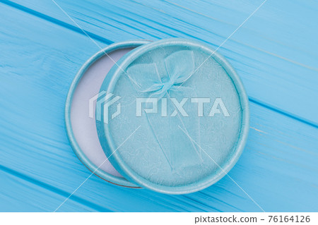Blue round cosmetic powder for makeup. Blue round cosmetic powder for makeup. 76164126