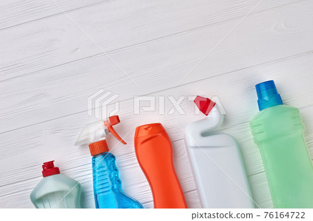 Collection of containers with liquid for cleaning. 76164722