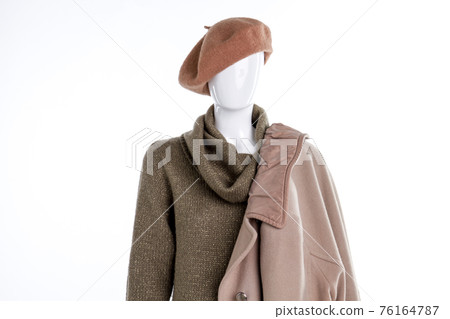 Beret and coat on female mannequin. 76164787