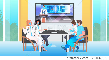 doctors having virtual conference medical specialists in masks discussing during video call coronavirus pandemic doctors having virtual conference medical specialists in masks discussing during video call coronavirus pandemic 76166133