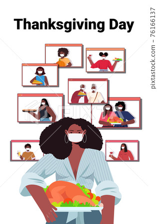 woman in mask discussing with family during video call people celebrating happy thanksgiving day woman in mask discussing with family during video call people celebrating happy thanksgiving day 76166137