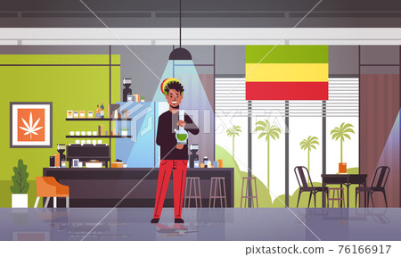 african american guy smoking marijuana with bong rastaman relaxing cannabis smoking hookah system coffeeshop interior full length horizontal african american guy smoking marijuana with bong rastaman relaxing cannabis smoking hookah system coffeeshop interior full length horizontal 76166917