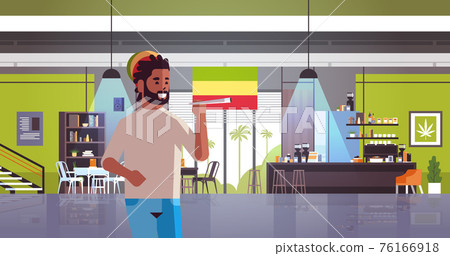 african american guy smoking marijuana joint rastaman relaxing with weed cigarette coffeeshop interior portrait horizontal african american guy smoking marijuana joint rastaman relaxing with weed cigarette coffeeshop interior portrait horizontal 76166918