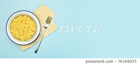 Pasta banner background. Mac and Cheese pasta on a blue background. American style Italian pasta with cheese. 76169935