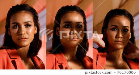India Woman has short straight black hair express feeling emotion 76170000