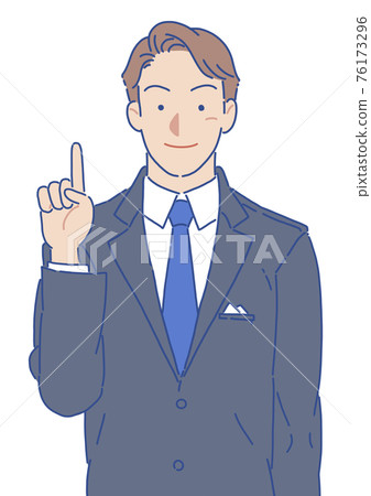 A man in a suit with his index finger smiling 76173296