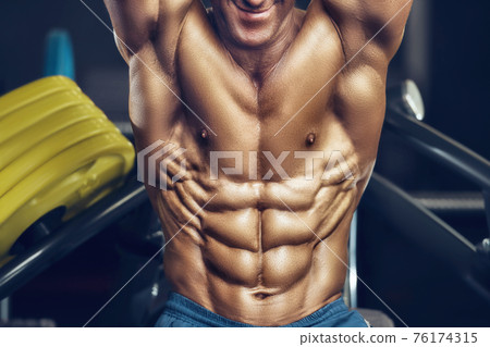 fit man training abs muscles at gym fit man training abs muscles at gym 76174315
