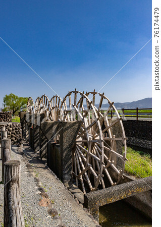 Active triple water wheel waiting for the rice cultivation season Asakura City, Fukuoka Prefecture Active triple water wheel waiting for the rice cultivation season Asakura City, Fukuoka Prefecture 76174479