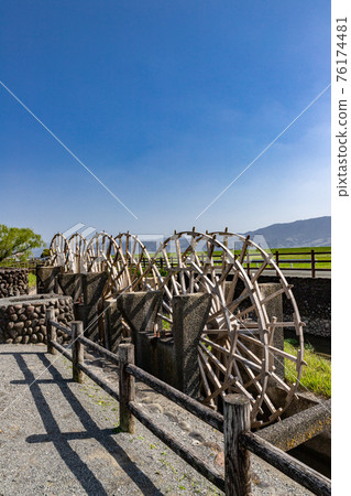 Active triple water wheel waiting for the rice cultivation season Asakura City, Fukuoka Prefecture Active triple water wheel waiting for the rice cultivation season Asakura City, Fukuoka Prefecture 76174481