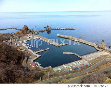 Aerial view of Udomari fishing port in Setana Town, Kita Hiyama Ward, Hokkaido in early spring Aerial view of Udomari fishing port in Setana Town, Kita Hiyama Ward, Hokkaido in early spring 76178578