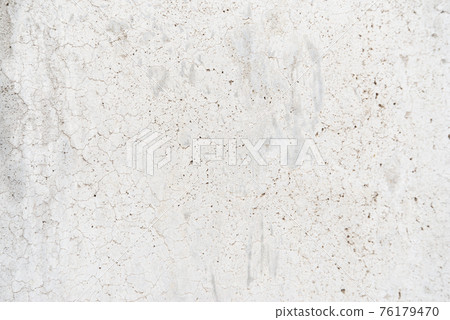 White wall with cracks and scratches White wall with cracks and scratches 76179470