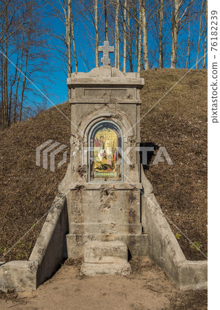 Russia. Kronstadt. April 3, 2019. A kiosk with an Icon of the Holy Great Martyr George the Victorious and a prayer, installed on the Kane battery, is now the Patriot Park Museum. 76182239