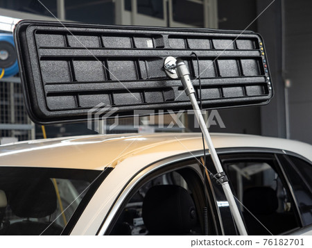 Repairing dents in a car Repairing dents in a car 76182701