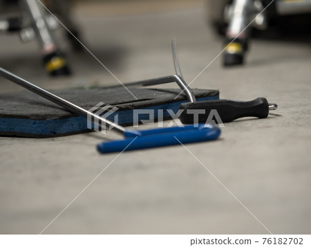 Repairing dents in a car Repairing dents in a car 76182702