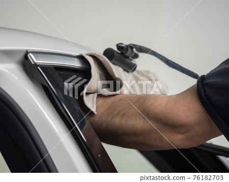 Repairing dents in a car Repairing dents in a car 76182703