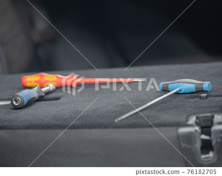 Repairing dents in a car Repairing dents in a car 76182705