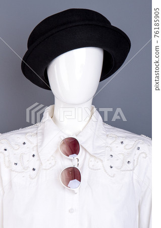 Female black hat on mannequin. 76185905