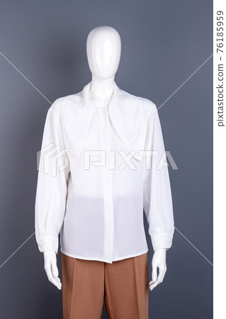 Female white elegant shirt on mannequin. 76185959
