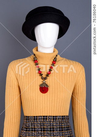 Top mannequin in women clothes, cropped image. Top mannequin in women clothes, cropped image. 76186040