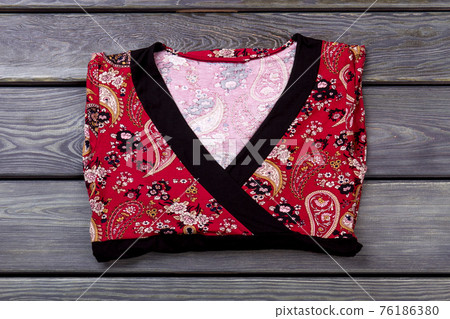 Red ornamented blouse. 76186380