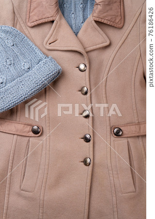 Close up brown overcoat texture. 76186426