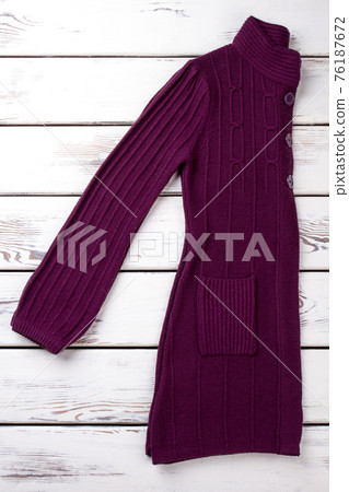 Folded purple woolen coat. Folded purple woolen coat. 76187672