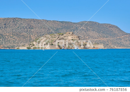 Greece Crete, Medieval fortress on the island of Spinalonga, view from the sea Greece Crete, Medieval fortress on the island of Spinalonga, view from the sea 76187856
