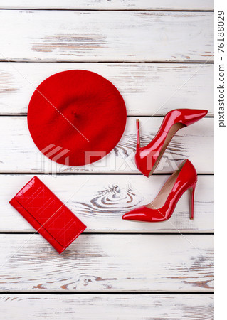 Red apparel, shoes, hat and wallet. 76188029