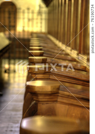 Pews in a church monastery 76190734