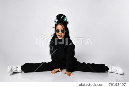 Attractive young korean woman wearing black hoodie 76192407