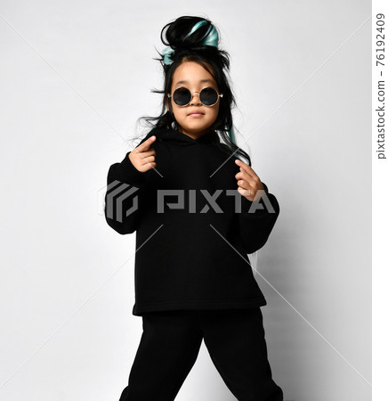 Korean teen girl in fashionable red hoodie and 76192409