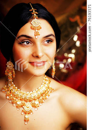 beauty sweet real indian girl in sari smiling on black background beauty sweet real indian girl in sari smiling on black background 76193571