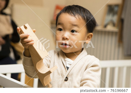 Boys playing in the kids space Boys playing in the kids space 76196667