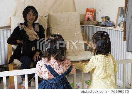 Girls playing in the kids space Girls playing in the kids space 76196670
