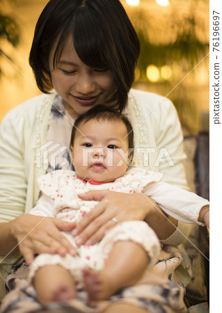 Parent and child holding Parent and child holding 76196697