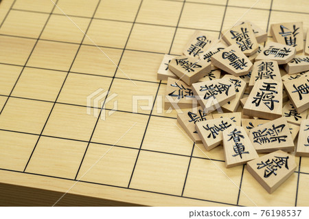 Shogi pieces on the board 76198537