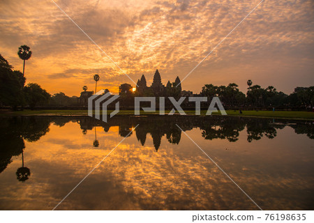 The silhouette of Angkor Wat before sunrise in Siem Reap province of Cambodia. The silhouette of Angkor Wat before sunrise in Siem Reap province of Cambodia. 76198635
